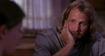 Movie still from “Fly Away Home” (1996), directed by Carroll Ballard – A person with long hair and a beard; Close Up shot, Low angle