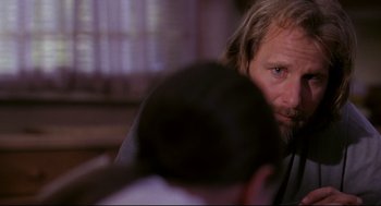 Movie still from “Fly Away Home” (1996), directed by Carroll Ballard – A person sitting in a room; Close Up shot, Over the shoulder angle