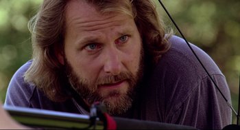 Movie still from “Fly Away Home” (1996), directed by Carroll Ballard – A person with long hair and a beard; Close Up shot, Low angle