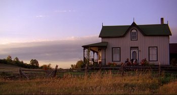 Movie still from “Fly Away Home” (1996), directed by Carroll Ballard – An old farm house sitting in a grassy field; Extreme Wide shot, Low angle