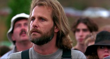 Movie still from “Fly Away Home” (1996), directed by Carroll Ballard – A person with long hair and a beard; Close Up shot, Low angle