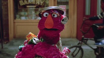 Movie still from “Follow That Bird” (1985), directed by Ken Kwapis – A stuffed animal with a hat on it's head; Close Up shot, High angle