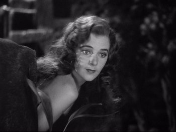 Movie still from “Footlight Parade” (1933), directed by Lloyd Bacon – A black - and - white photo of a woman with long hair; Close Up shot, High angle