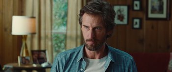 Movie still from “Footloose” (2011), directed by Craig Brewer – A person with a beard; Close Up shot, Over the shoulder angle