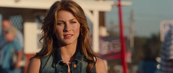 Movie still from “Footloose” (2011), directed by Craig Brewer – A beautiful young woman with long brown hair and blue eyes; Close Up shot, Over the shoulder angle
