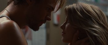 Movie still from “Footloose” (2011), directed by Craig Brewer – A man and a woman face to face in a room; Close Up shot, Over the shoulder angle
