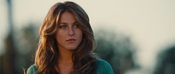Movie still from “Footloose” (2011), directed by Craig Brewer – A beautiful young woman with long brown hair and blue eyes; Close Up shot, Over the shoulder angle