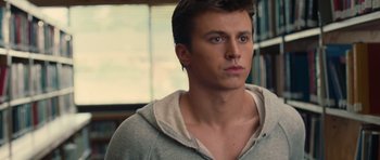 Movie still from “Footloose” (2011), directed by Craig Brewer – A young man in a hoodie stares into the distance; Close Up shot, Over the shoulder angle