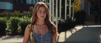 Movie still from “Footloose” (2011), directed by Craig Brewer – A beautiful young lady with long brown hair; Close Up shot, Over the shoulder angle