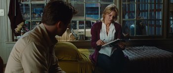 Movie still from “Footloose” (2011), directed by Craig Brewer – A man and a woman sitting on a couch; Medium shot, High angle