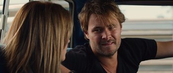 Movie still from “Footloose” (2011), directed by Craig Brewer – A man and a woman in the back of a car; Close Up shot, Over the shoulder angle