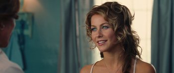 Movie still from “Footloose” (2011), directed by Craig Brewer – A person with curly brown hair; Close Up shot, Over the shoulder angle