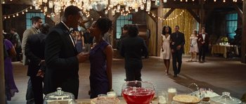 Movie still from “Footloose” (2011), directed by Craig Brewer – A group of people standing in a room; Medium shot, Over the shoulder angle