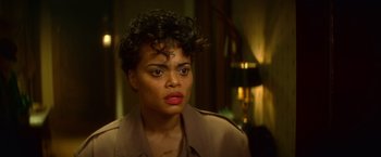 Movie still from “The United States vs. Billie Holiday” (2021), directed by Lee Daniels – A person wearing a jacket; Close Up shot, High angle