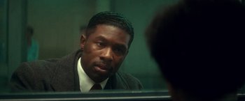 Movie still from “The United States vs. Billie Holiday” (2021), directed by Lee Daniels – A man looking at himself in the mirror; Close Up shot, Over the shoulder angle