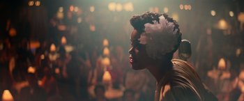 Movie still from “The United States vs. Billie Holiday” (2021), directed by Lee Daniels – A person wearing a hat; Close Up shot, Low angle
