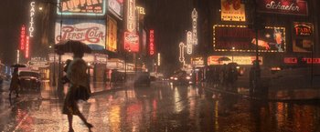 Movie still from “The United States vs. Billie Holiday” (2021), directed by Lee Daniels – A city street filled with lots of traffic at night; Extreme Wide shot, High angle