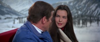 Movie still from “For Your Eyes Only” (1981), directed by John Glen – A man and a woman talking to each other; Close Up shot, Over the shoulder angle