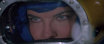 Movie still from “For Your Eyes Only” (1981), directed by John Glen – A person's eyes looking at the camera; Close Up shot, Overhead angle