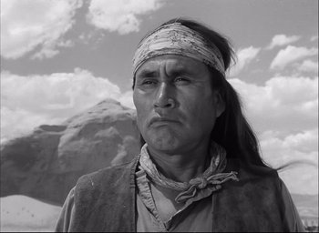 Movie still from “Fort Apache” (1948), directed by John Ford – A man with a bandana on his head; Close Up shot, Low angle