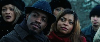 Movie still from “Four Brothers” (2005), directed by John Singleton – A man and a woman standing next to each other in the snow; Close Up shot, Low angle