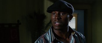 Movie still from “Four Brothers” (2005), directed by John Singleton – A person wearing a hat; Close Up shot, High angle