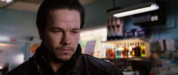 Movie still from “Four Brothers” (2005), directed by John Singleton – A person wearing a leather jacket; Close Up shot, Over the shoulder angle
