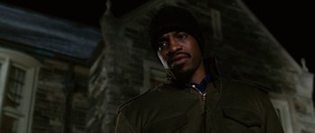 Movie still from “Four Brothers” (2005), directed by John Singleton – A man wearing a jacket and a hat; Close Up shot, Low angle
