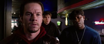 Movie still from “Four Brothers” (2005), directed by John Singleton – A man in a red jacket and two other men in a black jacket; Close Up shot, Low angle