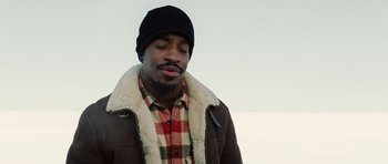 Movie still from “Four Brothers” (2005), directed by John Singleton – A man wearing a hat and a jacket; Close Up shot, High angle