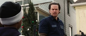 Movie still from “Four Brothers” (2005), directed by John Singleton – A person wearing a shirt; Close Up shot, Low angle