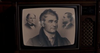 Movie still from “Foxcatcher” (2014), directed by Bennett Miller – A picture of a man with three different hair styles; Extreme Close Up shot, High angle