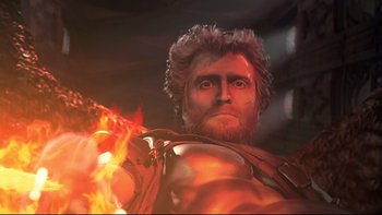 Movie still from “Frailty” (2001), directed by Bill Paxton – An image of a man that is in the middle of a fire; Close Up shot, Low angle