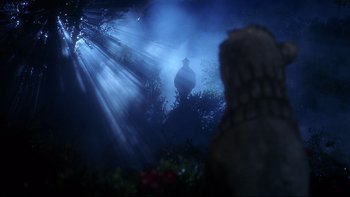 Movie still from “Frailty” (2001), directed by Bill Paxton – A man is standing in the middle of a forest; Wide shot, Low angle