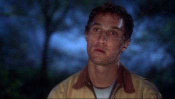 Movie still from “Frailty” (2001), directed by Bill Paxton – A person wearing a jacket; Close Up shot, Low angle