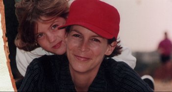 Movie still from “Freaky Friday” (2003), directed by Mark Waters – A woman and a girl wearing a red hat; Close Up shot, High angle
