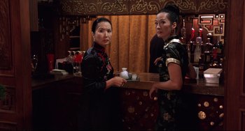 Movie still from “Freaky Friday” (2003), directed by Mark Waters – Two asian women standing next to each other in a room; Medium shot, Over the shoulder angle
