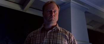 Movie still from “Freddy vs. Jason” (2003), directed by Ronny Yu – A person wearing a plaid shirt; Close Up shot, Low angle