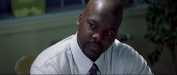 Movie still from “Freddy vs. Jason” (2003), directed by Ronny Yu – A person wearing a shirt and a tie; Close Up shot, Low angle