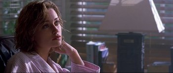 Movie still from “Freddy vs. Jason” (2003), directed by Ronny Yu – A person wearing a pink shirt; Close Up shot, Low angle