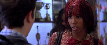 Movie still from “Freddy vs. Jason” (2003), directed by Ronny Yu – A woman with red hair is talking to another woman; Close Up shot, Over the shoulder angle