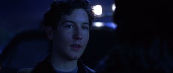 Movie still from “Freddy vs. Jason” (2003), directed by Ronny Yu – A young man is looking into the distance; Close Up shot, Over the shoulder angle