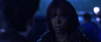 Movie still from “Freddy vs. Jason” (2003), directed by Ronny Yu – A person with a person in the background; Close Up shot, Over the shoulder angle