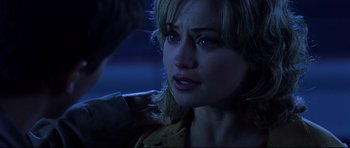 Movie still from “Freddy vs. Jason” (2003), directed by Ronny Yu – A person with her eyes wide open; Close Up shot, Over the shoulder angle