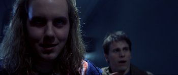 Movie still from “Freddy vs. Jason” (2003), directed by Ronny Yu – A woman and a man are looking at the camera; Close Up shot, Over the shoulder angle