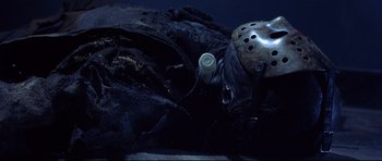 Movie still from “Freddy vs. Jason” (2003), directed by Ronny Yu – A hockey mask and a hockey stick; Close Up shot, Low angle
