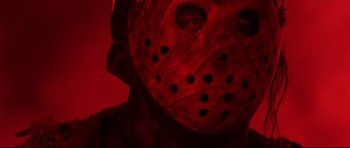 Movie still from “Freddy vs. Jason” (2003), directed by Ronny Yu – A man's face in a red light; Close Up shot, Low angle