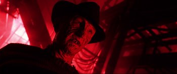 Movie still from “Freddy vs. Jason” (2003), directed by Ronny Yu – The face of a man in a fedora; Close Up shot, Low angle