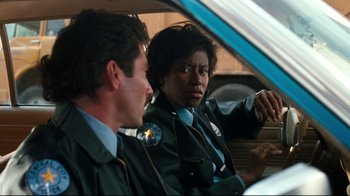 Movie still from “Freddy's Dead: The Final Nightmare” (1991), directed by Rachel Talalay – A man and a woman sitting next to each other in a car; Close Up shot, Low angle