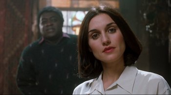 Movie still from “Freddy's Dead: The Final Nightmare” (1991), directed by Rachel Talalay – A person near a window; Close Up shot, Over the shoulder angle